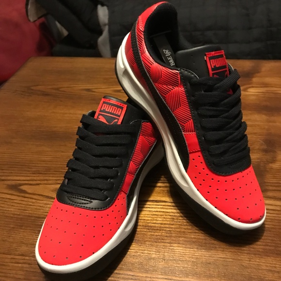 puma red and black sneakers